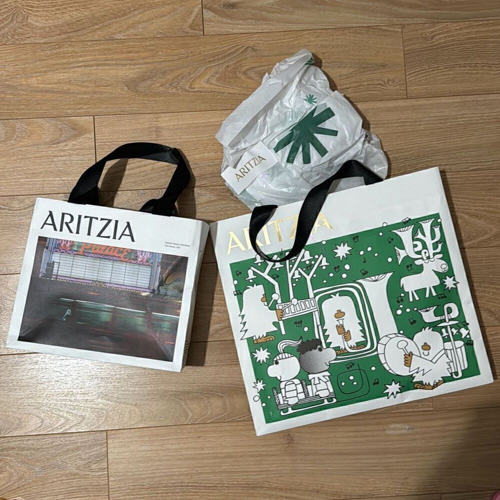 Aritzia shopping bags (2) and‎ gift wrapping paper
